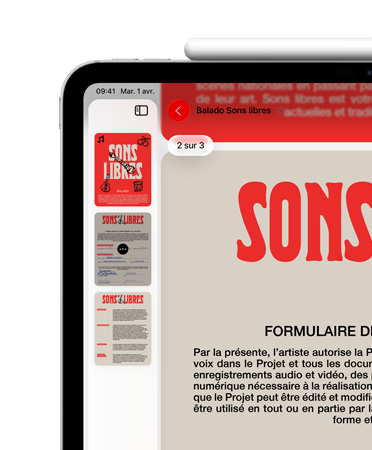 iPad, orientation paysage, un Apple Pencil est fixé magnétiquement sur le dessus, seule la partie supérieure gauche de l’écran est visible, elle affiche un PDF dans l’app Aperçu