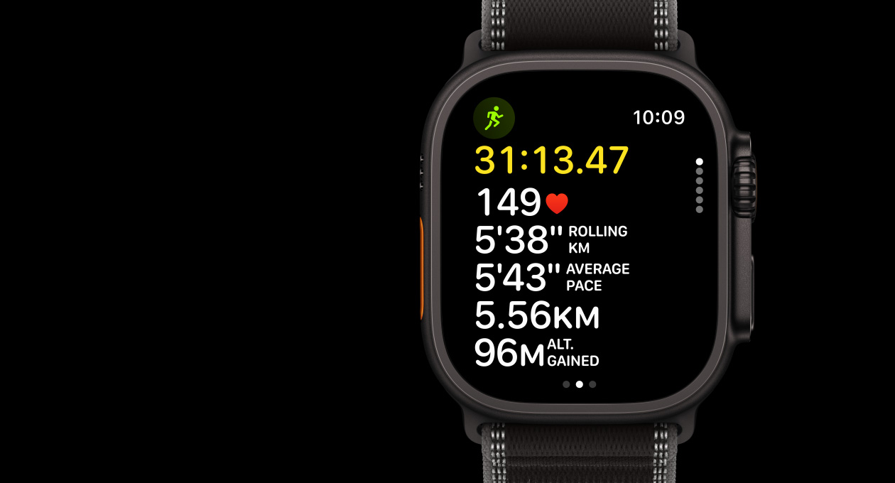 Apple Watch Ultra 3, black colour, titanium case, Workout app, Outdoor Run, left side exterior, Action button, right side exterior, Digital Crown, side button, band, Trail Loop, black/charcoal colour