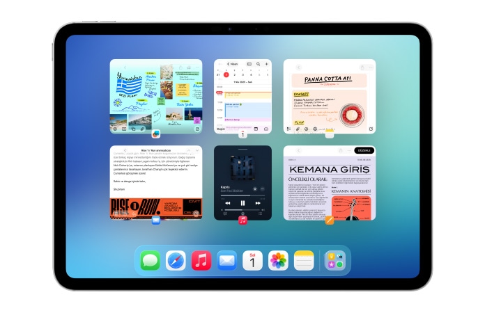 iPad, yatay pozisyonda, ekranda Takvim ve Müzik gibi birden fazla uygulama iki sıra halinde eşit şekilde gösterilen altı pencere olarak görünüyor