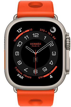 Apple Watch Hermès Ultra 3, Circulaire analogue watch face, (hour, minute and second hands, complications: Weather, activity rings, Paris time and UV Index), titanium case, natural colour, right side exterior, Digital Crown, raised side button, paired with Scub’H Diving strap, orange néon colour (bright orange), moulded rubber material, circular cutouts centred