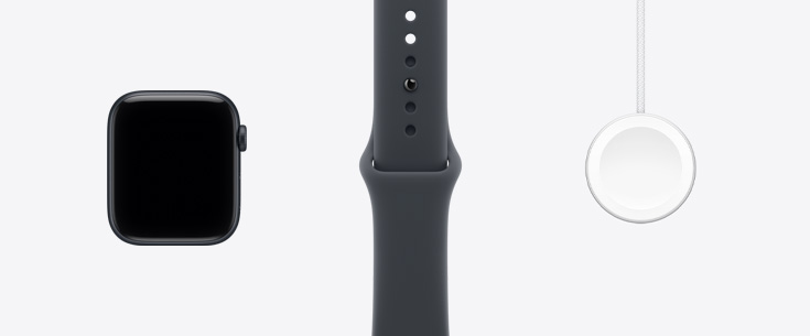 Apple Watch SE 3, hliníkový kryt, polnočná farba, predná vonkajšia strana, displej od okraja po okraj, športový remienok vo farbe polnočná, magnetický rýchlonabíjací kábel USB‑C na Apple Watch