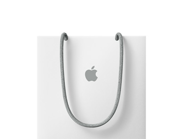 Shopping bag bianca, manici in corda grigia, logo Apple grigio al centro