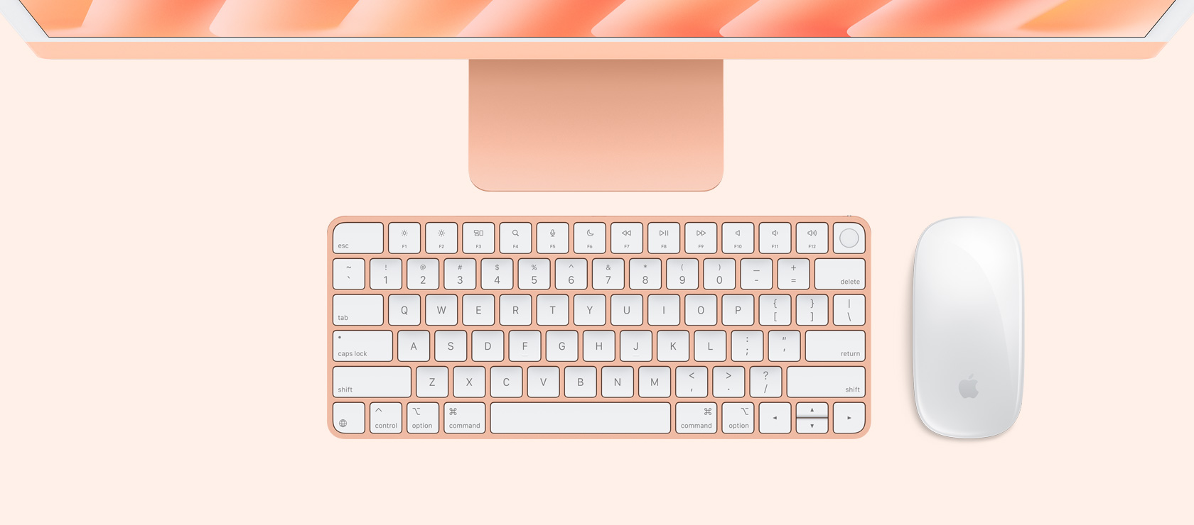Imagem aérea de um iMac laranja com mouse e keyboard na mesma cor