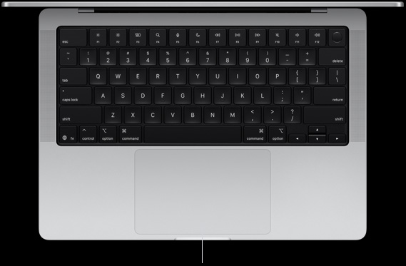 Vue en plongée du MacBook Pro 14 pouces ouvert, montrant le trackpad Force Touch au bas du clavier